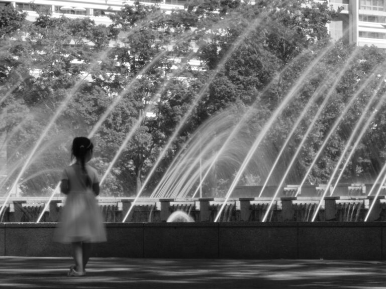 Girl in front of the water